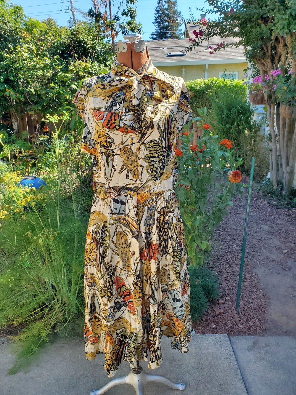 Trashy Diva Cream Insectarium Marie Midi Dress with Orange Accents